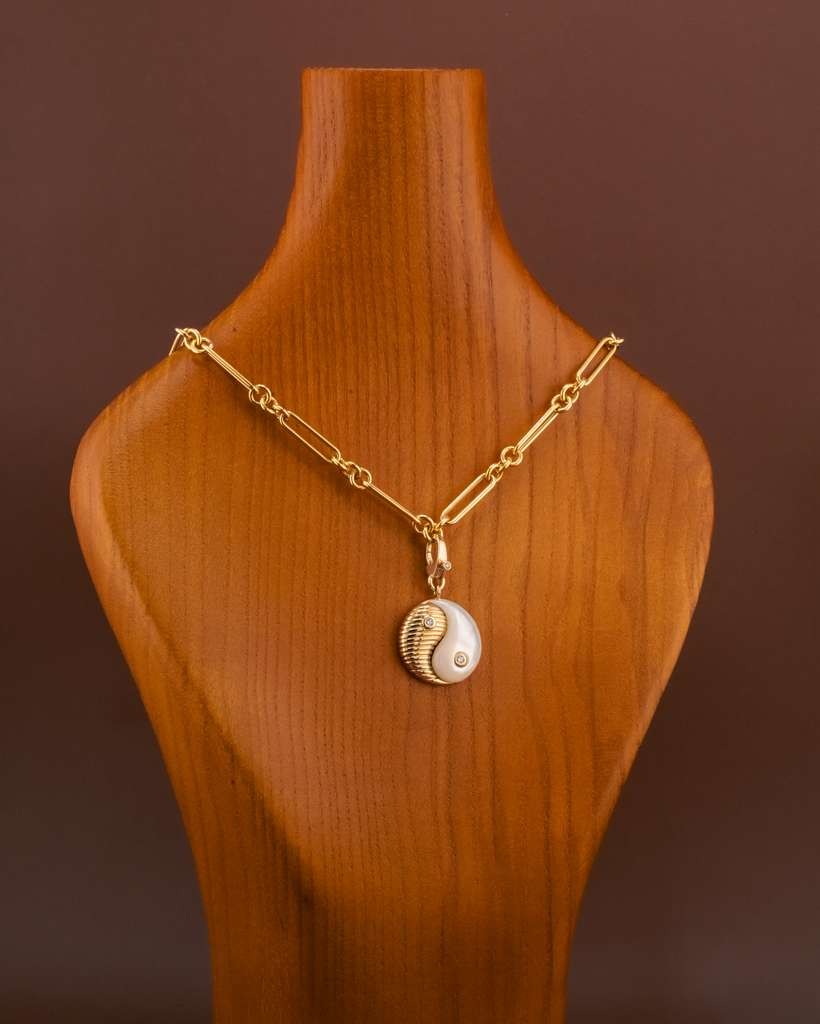 D'ORO yin yang pendant on a gold chain