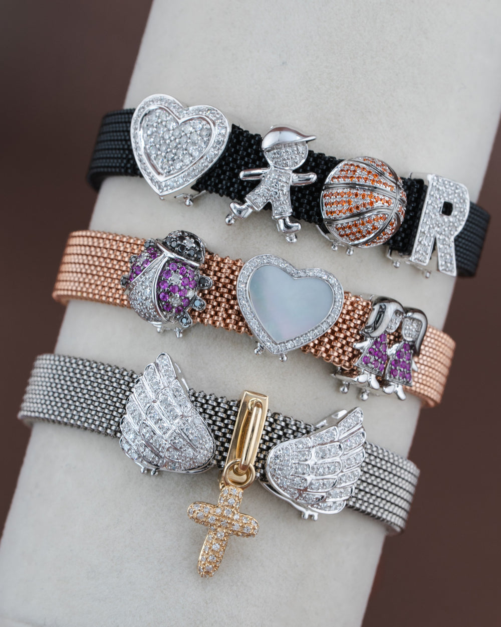 D'ORO charm bracelets with heart, angel wing and initial charms