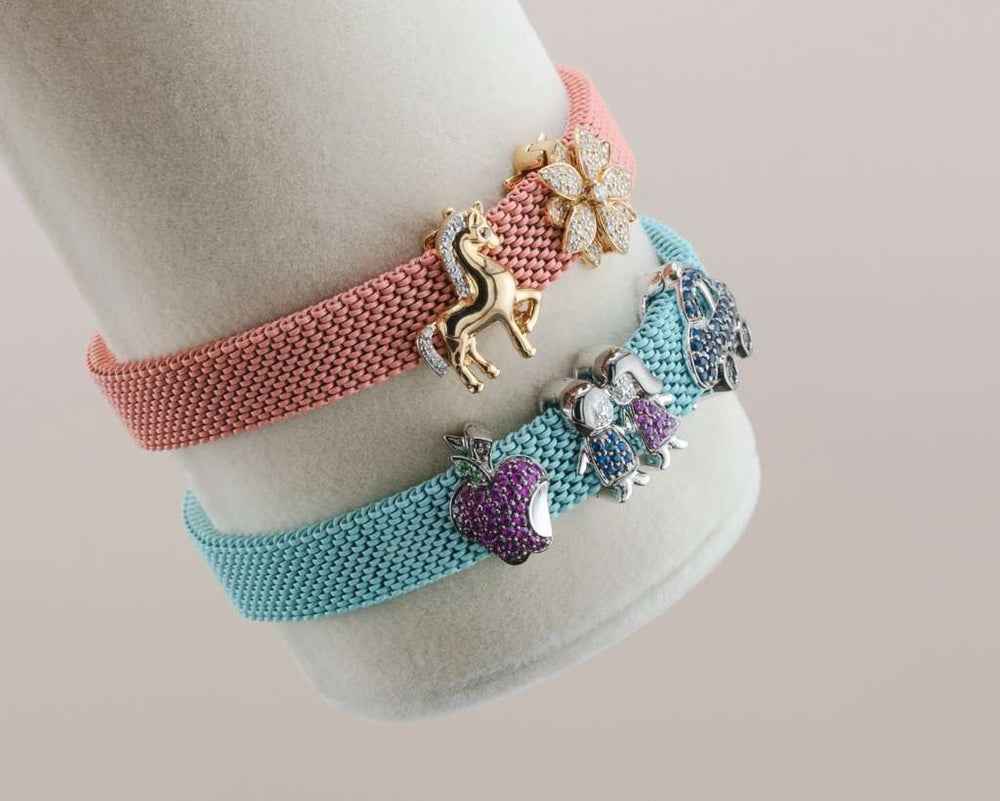 D'ORO pink and turquoise charm bracelets