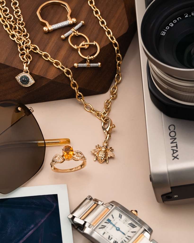 D'ORO gold chains, rings and charms styled with everyday treasures