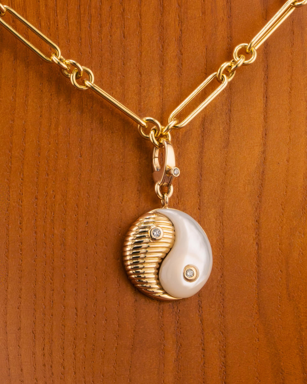 D'ORO gold and mother of pearl yin yang pendant with diamonds