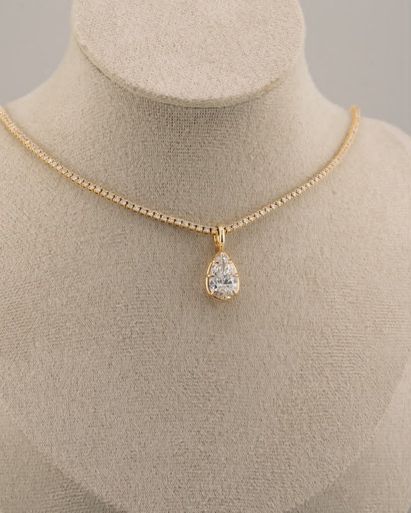 D'ORO Lab pear lab-grown diamond on a diamond tennis necklace